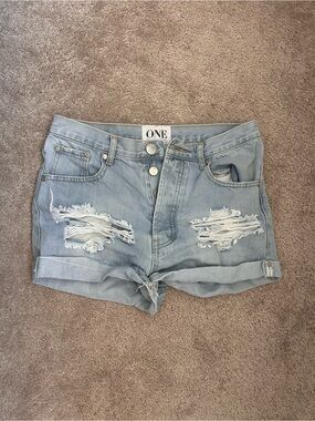 Light Wash Distressed Denim Roll-Hem Shorts